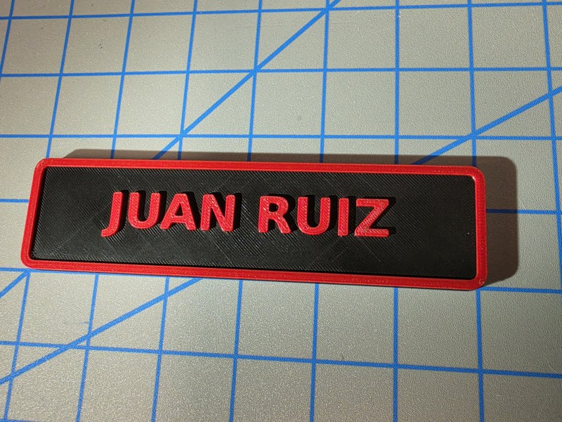 Toolbox name label — JUAN RUIZ in red on black